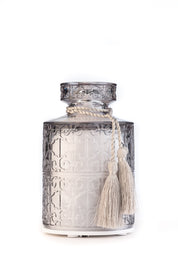 Grey cut glass aromatherapy diffuser with elegant tassel. Charge up with USB cable and control with remote for different light settings.