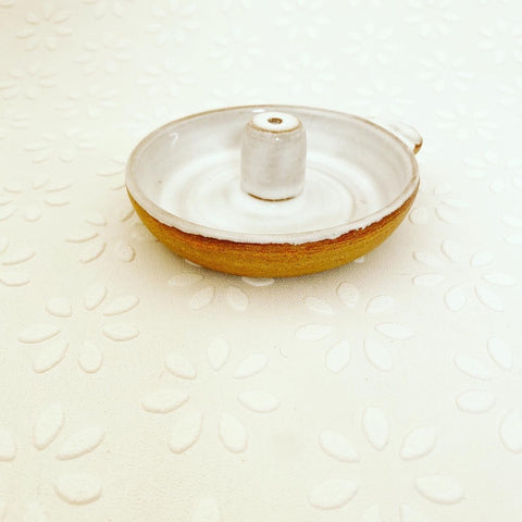 Unique, handmade exclusively for Bare Nordic Beauty, Skåne Ljus have created a ceramic incense holder for incense sticks in local clay, glazed gloss white on the inside with the outer left natural . with hand tag ash collector