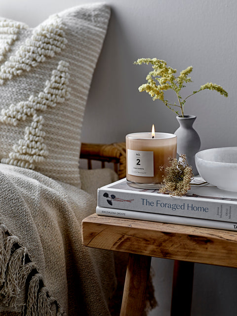 Pretty scented candle in soft toned glass jar for Nordic home style from Bloomingville