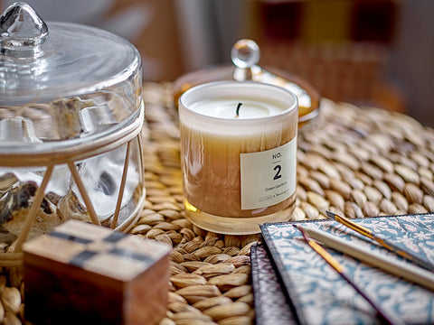 Pretty scented candle in soft toned glass jar for Nordic home style from Bloomingville