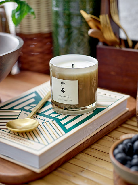 Pretty scented candle in soft toned glass jar for Nordic home style from Bloomingville