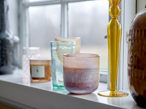 Pretty scented candle in soft toned glass jar for Nordic home style from Bloomingville