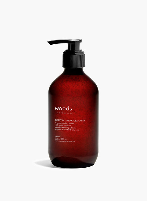 Brown pump bottle of with natural, organic vegan Daily Foaming Cleanser for all skins, unisex , made by Woods Copenhagen
