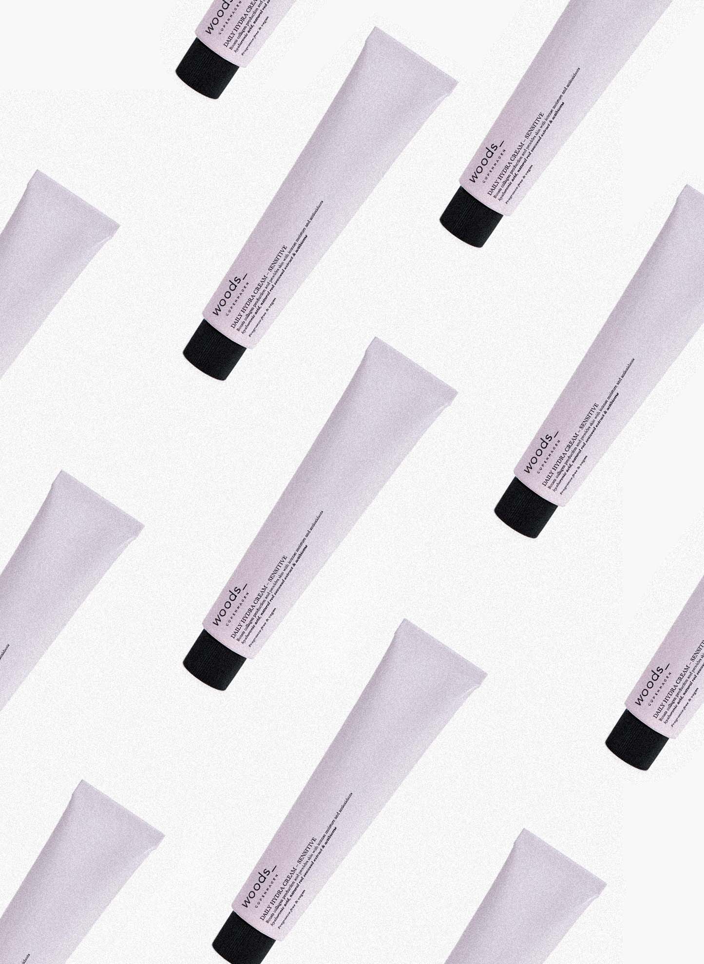 Pale lilac metal tube of all natural, organic vegan Daily Hydra Cream Sensitive to moisturise all skins, unisex , made by Woods Copenhagen. (8511151669553)