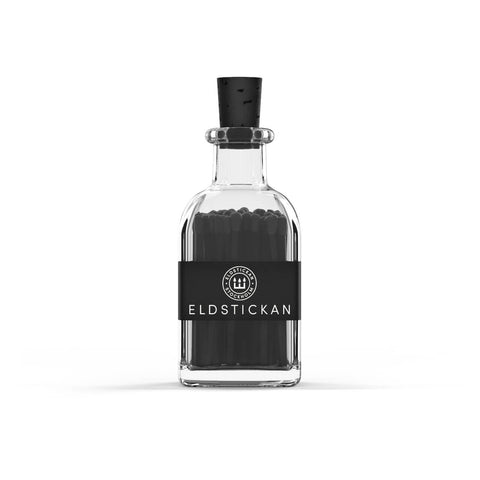 All black chic coloured matches in a stylish glass bottle from Eldstickan for a great interior design idea