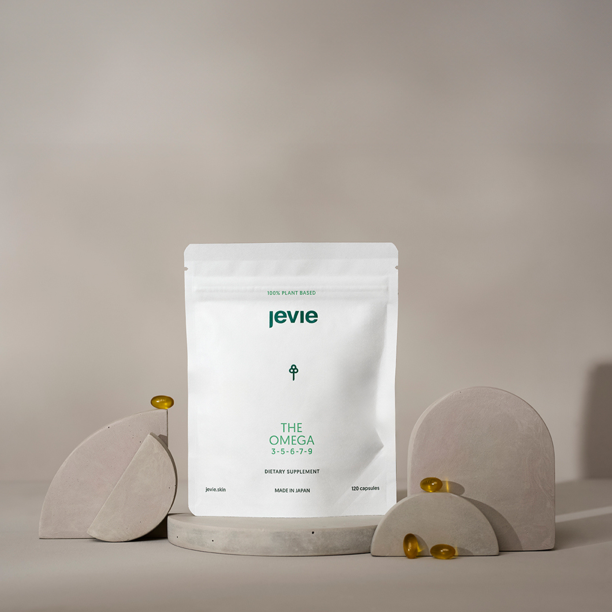 White pouch of Jevie Omega 3-5-6-7-9 supplement, clean omega fatty acids for skin and wellness