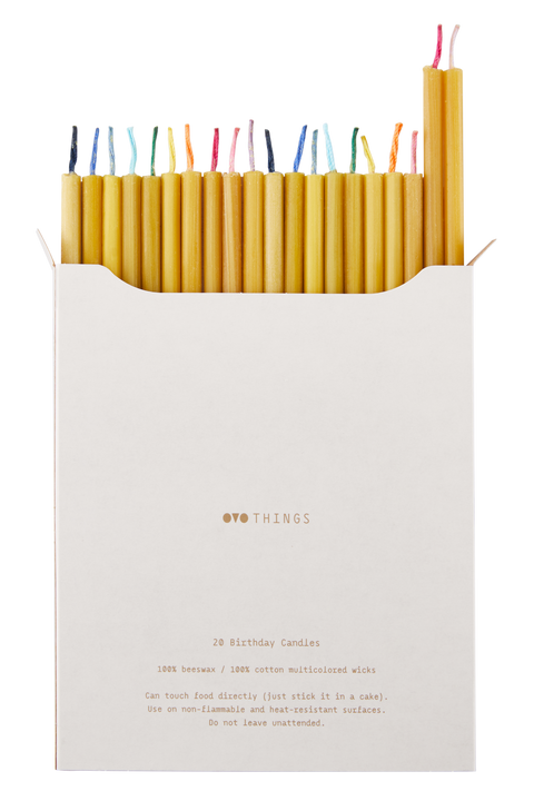 Great gift idea! Simple and elegant, stylish hand poured short thin beeswax taper candles with coloured wicks from Ovo Things