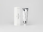 Stylish & refined white box with statement text containing luxury organic hand cream tube with natural Tulip perfume from Tangent GC