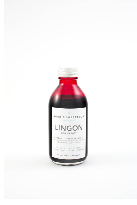 Glass bottle of pure, concentrated raw pressed lingonberry health shot from Nordic Superfoods.