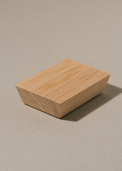 Minimalist Hinoki wood soap rest on a neutral background, sustainably hand crafted in Japan for gentle soap drying and timeless style