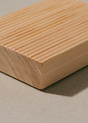 Close up detail of the minimalist Hinoki wood soap rest on a neutral background, sustainably hand crafted in Japan for gentle soap drying and timeless style