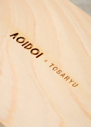 Close up detail of the m.nimalist Hinoki wood soap rest with the craftsman's name, sustainably hand crafted in Japan for Aoidoi