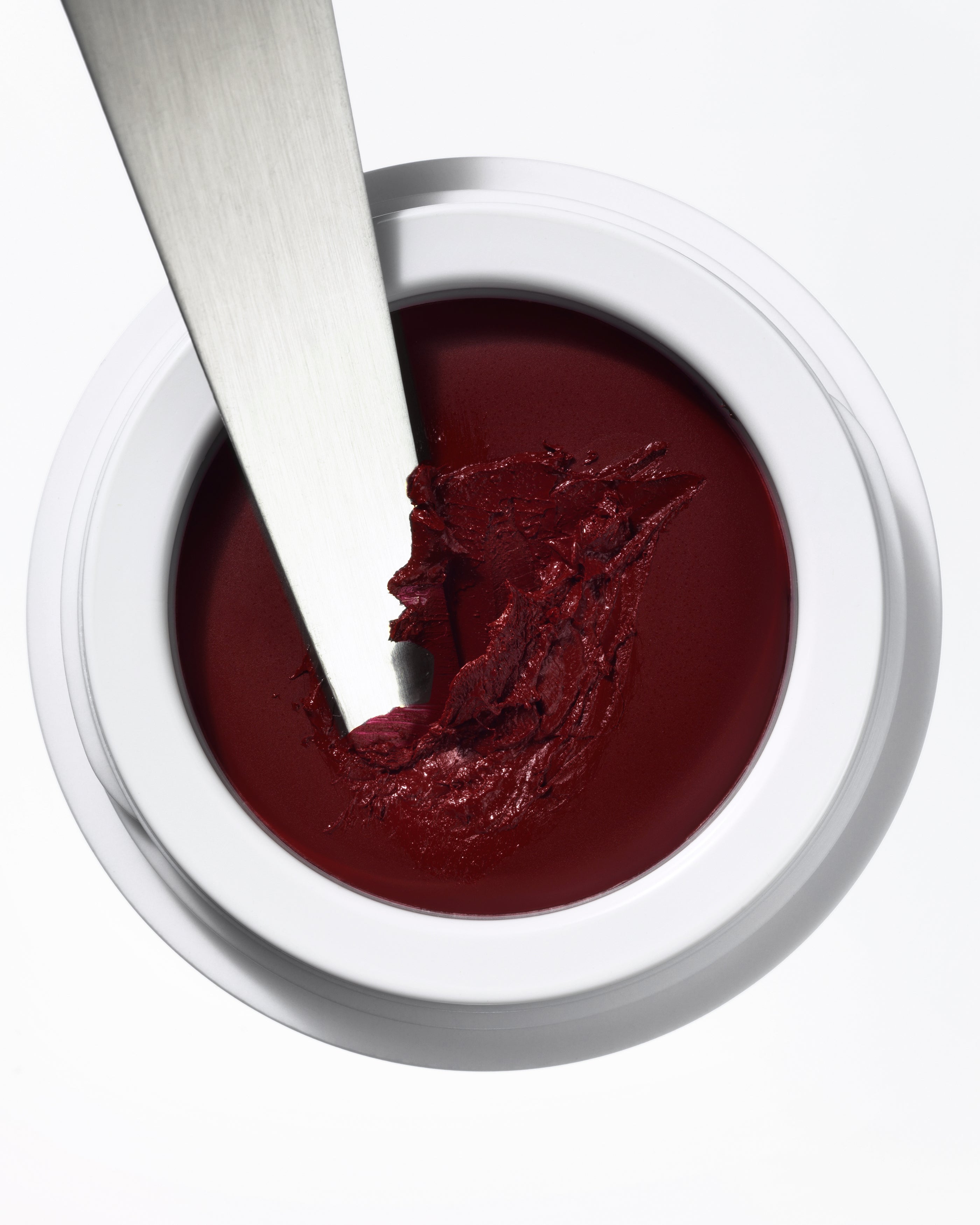 Deep berry tones of multi use natural and organic lip cheek & eye colour for all skin tones in minimalist white pots from Swedish make up brand Manasi7