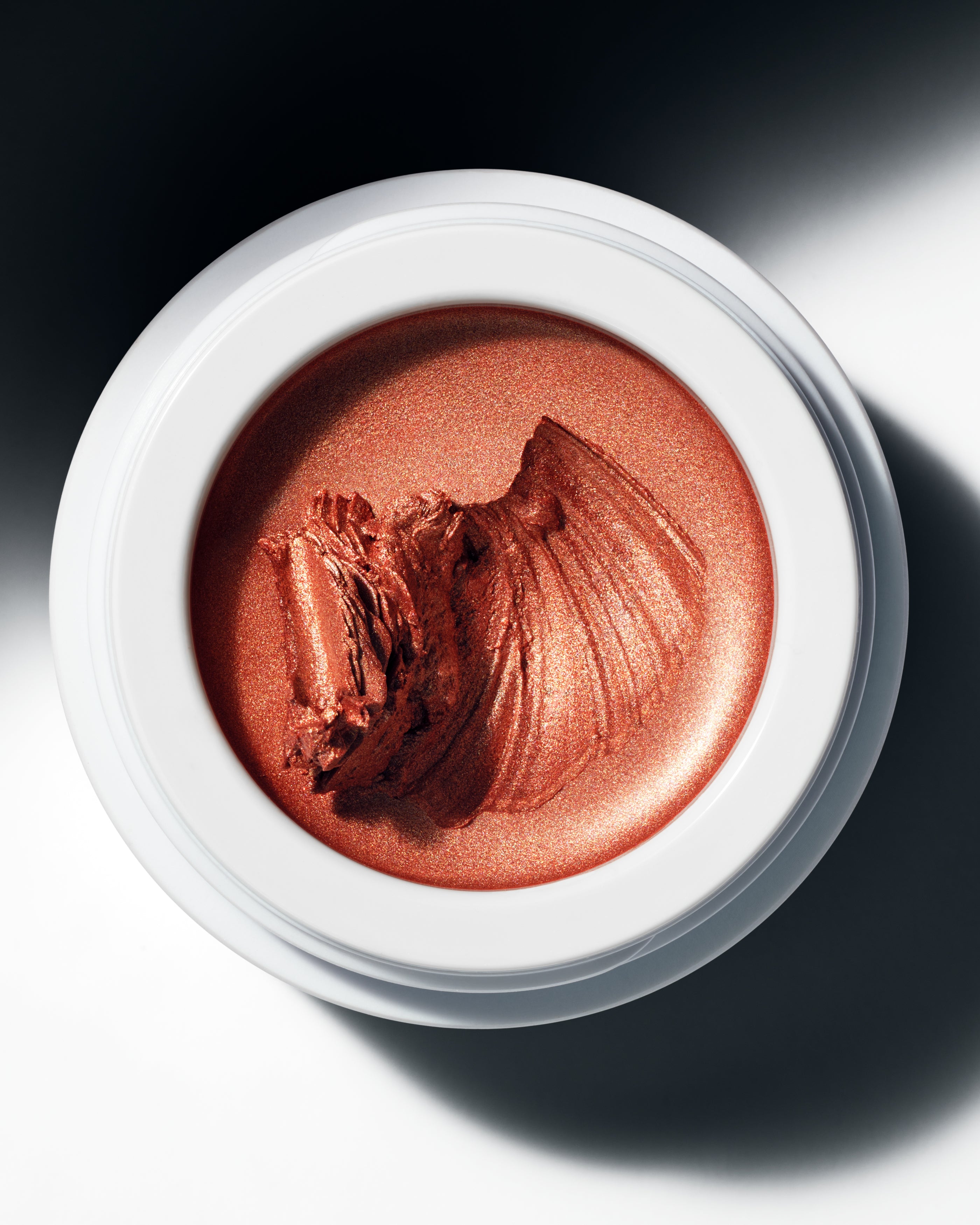 Golden copper tones of cream eye colour Chaminade, all natural and organic in minimalist white pots from Swedish cult make up brand Manasi7