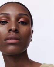 Golden copper tones of cream eye colour Chaminade suits all skin tones. All natural and organic in minimalist white pots from Swedish cult make up brand Manasi7