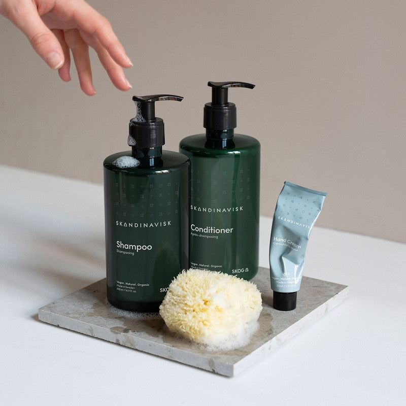 Off white Nordic tones of pocket sized organic handcream for both men & women