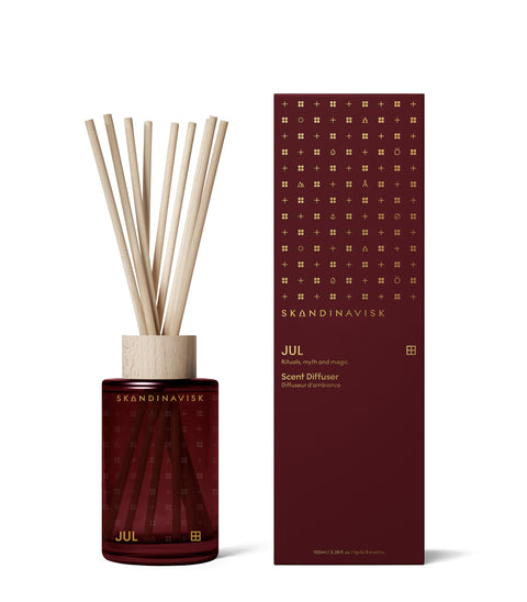 Limited edition, small sized room diffuser from Skandinavisk with the scent Jul, of the Nordic Christmas, in luxury dark red glass, 8 reeds and all natural and vegan scent.
