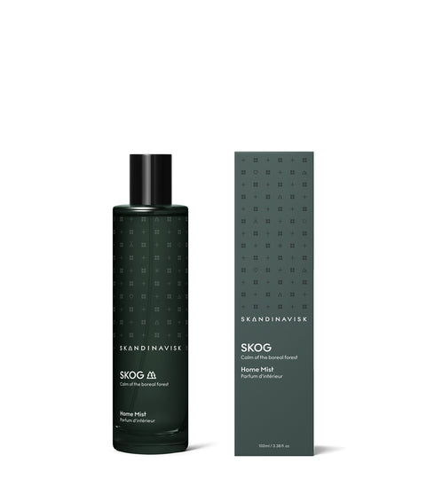 New room mist in Skog scent from Skandinavisk with the scent of the Nordic forests, in luxury dark green glass,  all natural and vegan scent.