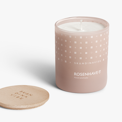 Rosenhave, organic vegan rose scented candle in soft pink toned glass jar for Nordic home style from Skandinavisk