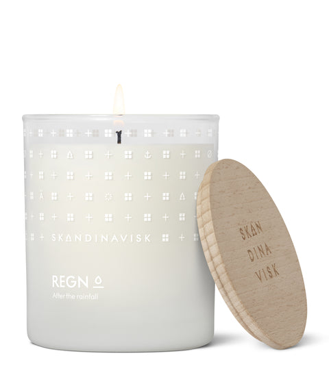 Regn Organic vegan rain scented candle in soft clear glass jar with wooden lid for Nordic home style from Skandinavisk