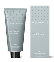 ØY; a gentle scent of water and quiet nature, from Skandinavisk, organic, natural & vegan hand cream in tubes of post consumer waste metal for best sustainability values that reflect the nature and landscape of Scandinavia.