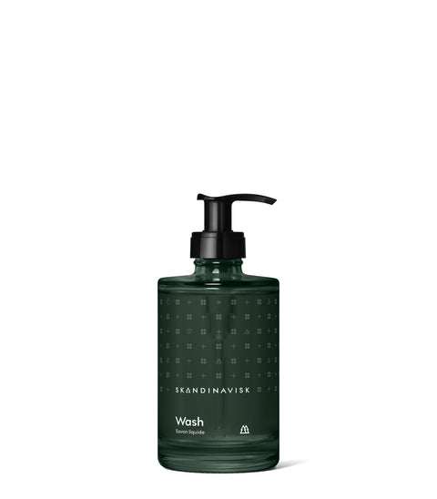 Sustainable, organic & vegan liquid soap and hand wash SKOG, from Skandinavisk in new luxury dark green 200ml glass bottle
