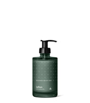 Sustainable, organic & vegan  hand and body lotion SKOG, from Skandinavisk in new luxury dark green 200ml glass bottle