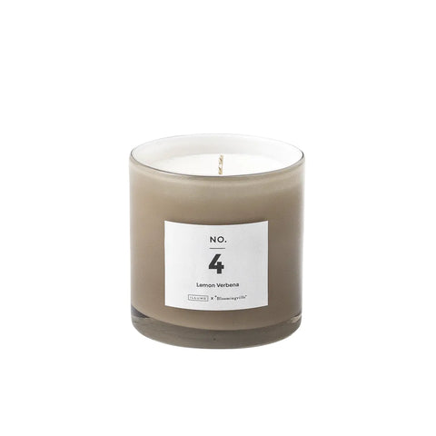 Pretty scented candle in soft toned glass jar for Nordic home style from Bloomingville