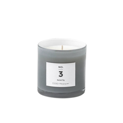 Pretty scented candle in soft toned glass jar for Nordic home style from Bloomingville
