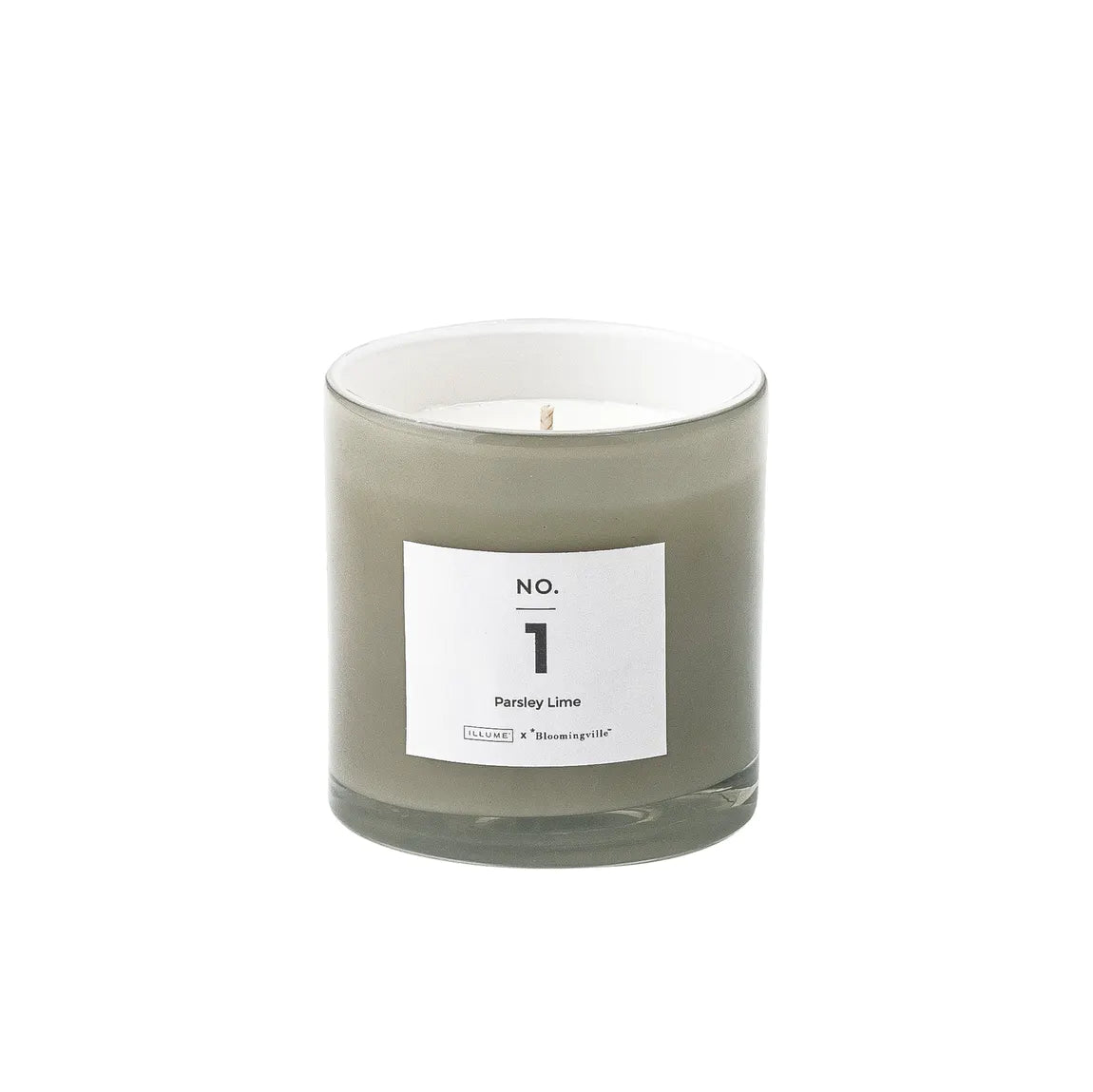 Pretty scented candle in soft toned glass jar for Nordic home style from Bloomingville