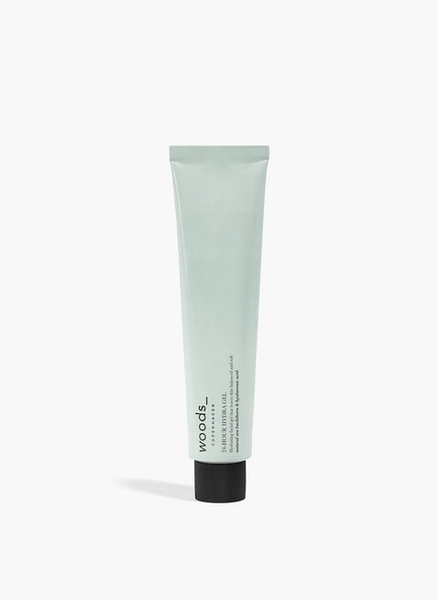 Light blue metal tube with natural, organic vegan 24 hr Hydra Gel to moisturise all skins, unisex , made by Woods Copenhagen. Great for use during sports.