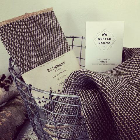 100% linen cloths in black weave o sit on in the sauna for hygiene and comfort. Easy to wash, dry without odour and will last for years due to traditional manufacture in Sweden by Växbo Lin