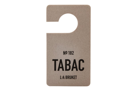 All natural, organic and vegan room scent on hanging tag with the smoky green scent of Tabac from the best of Sweden's coastal home fragrance brand, L:A Bruket