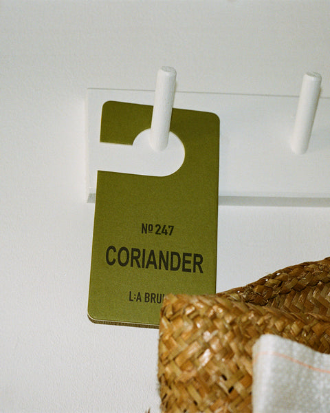 All natural, organic and vegan room scent on hanging tag with the green mint scent of Coriander from the best of Sweden's coastal home fragrance brand, L:A Bruket