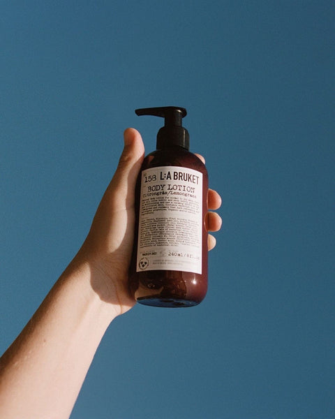 Natural, vegan & organic body lotion in brown pump bottle from the nature of Sweden's West Coast by the best selling minimalist L:A Bruket