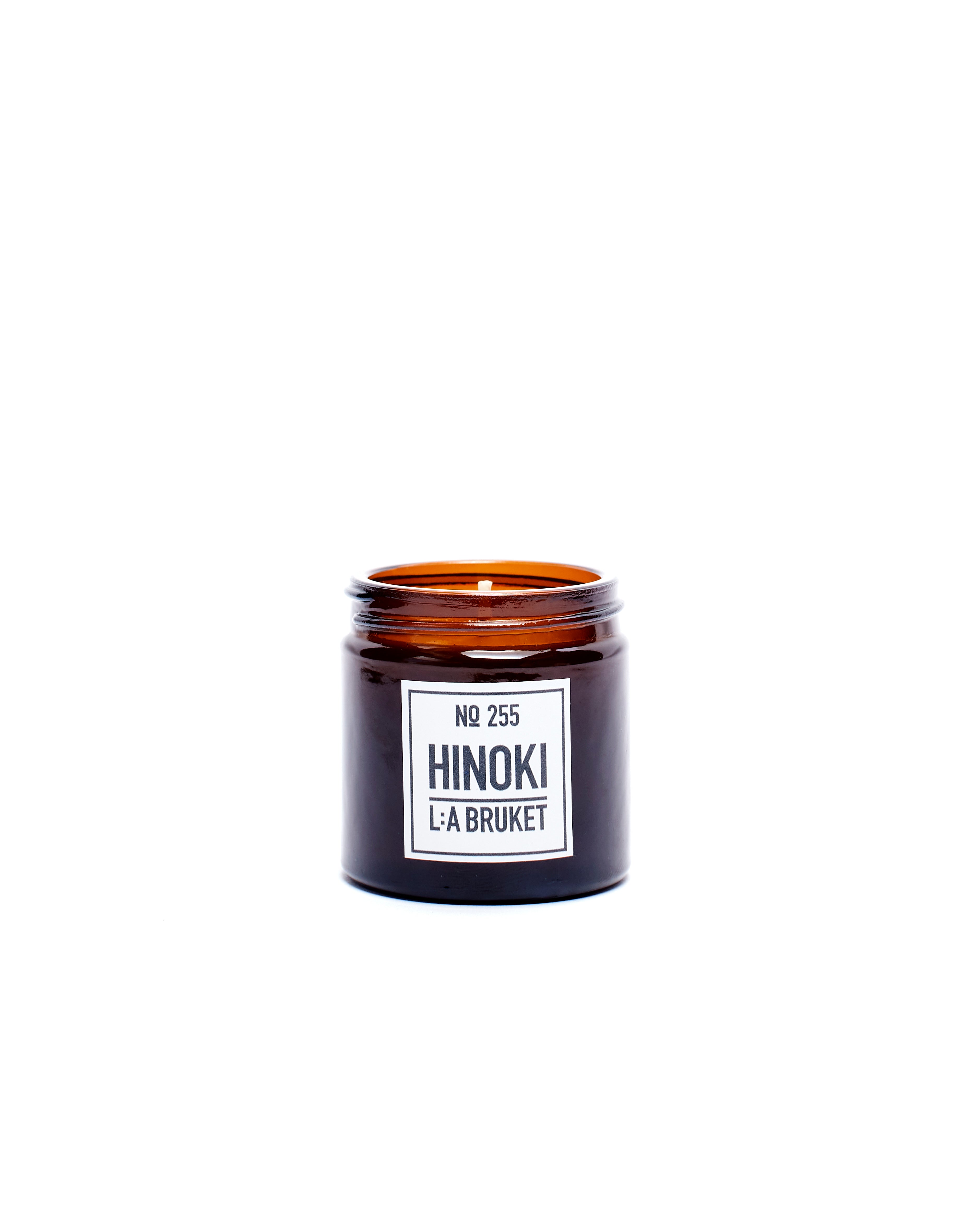 All natural, organic and vegan candle in amber glass with the green cypress scent of Hinoki from the best of Sweden's coastal home fragrance brand, L:A Bruket