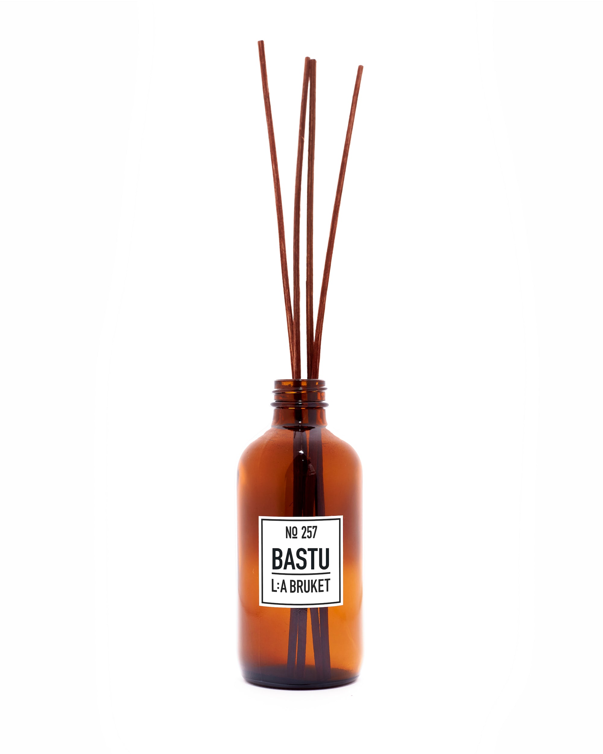 All natural, organic and vegan room diffuser in amber glass with the warm woody scent of Bastu from the best of Sweden's coastal home fragrance brand, L:A Bruket