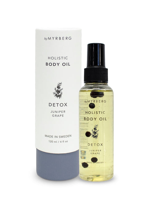 Luxury, natural body oil for massage, cupping or to nourish the skin with essential oils of juniper and grape, containing dried juniper berries to bring nature into your own home spa. By Myrberg