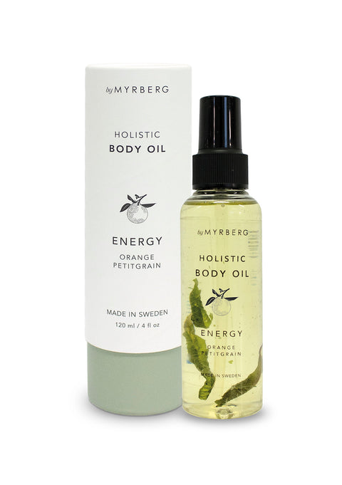 Luxury, natural body oil for massage, cupping or to nourish the skin with essential oils of juniper and grape, containing dried  petitgrain leaves to bring nature into your own home spa. By Myrberg