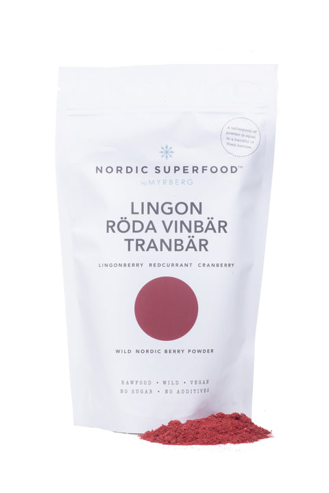 Large white pouch of powdered blend of 100% all natural, handpicked organic wild superfoods from the Nordic nature, with blend of red fruits - lingonberry, redcurrant and cranberry.