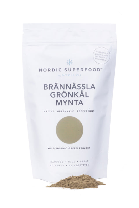 Large white pouch of powdered blend of 100% all natural, handpicked organic wild superfoods from the Nordic nature, with blend of green fruits - nettle, green kale and mint.