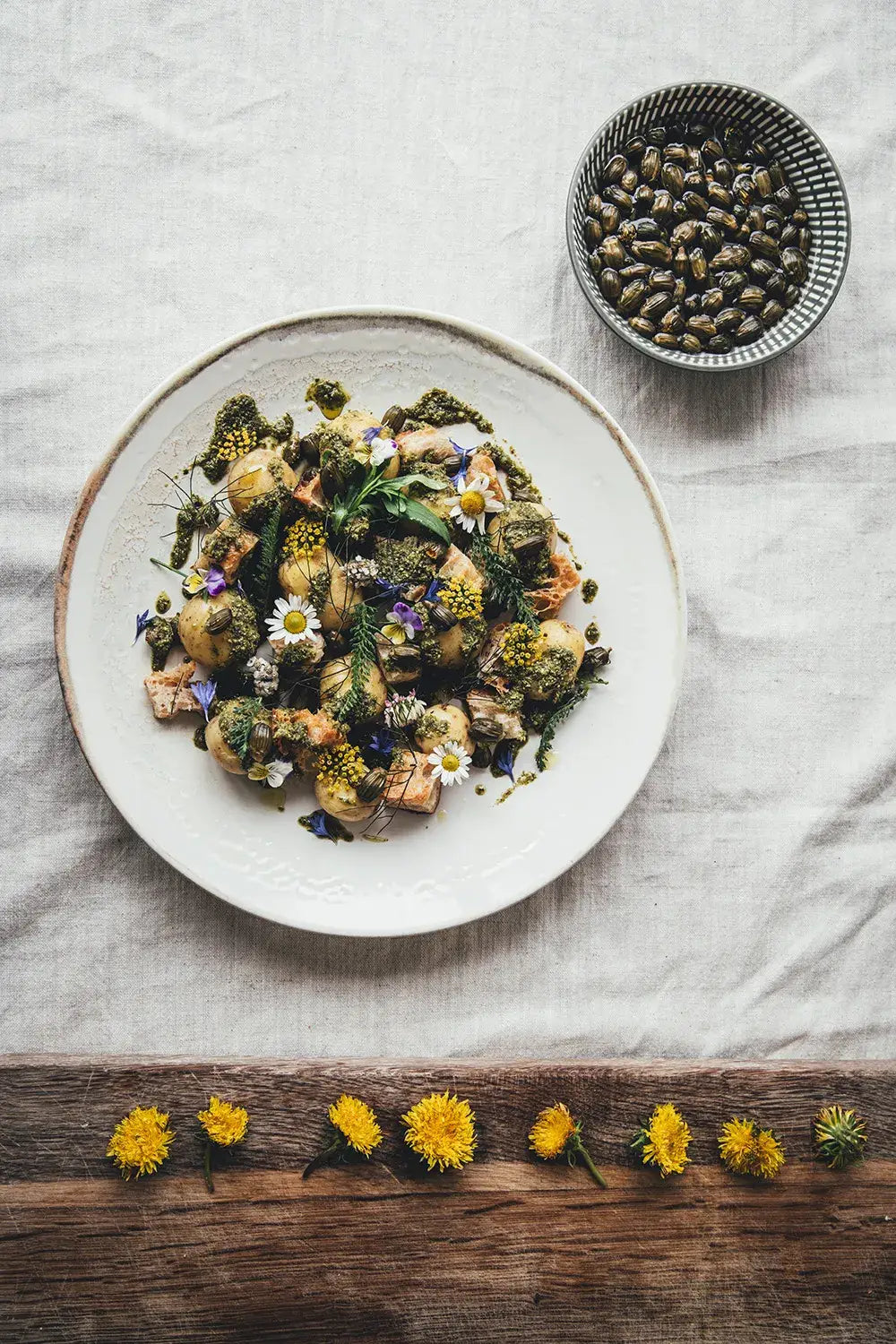 Hardcover book Flowers on a Plate combining food with flowers & nature with beautiful photography of Finnish life, by Cozy Publishing.