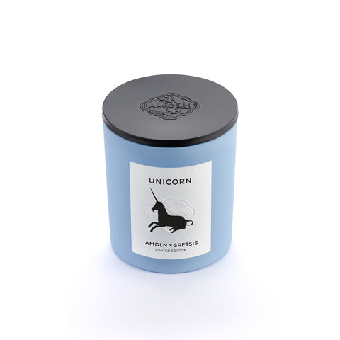 A collaboration with Amoln and Srestis design house creates a limited edition blue wax candle in the same sky blue ceramic jar, and black metal dust cover with a scent capturing the magic and mystery of the unicorn.