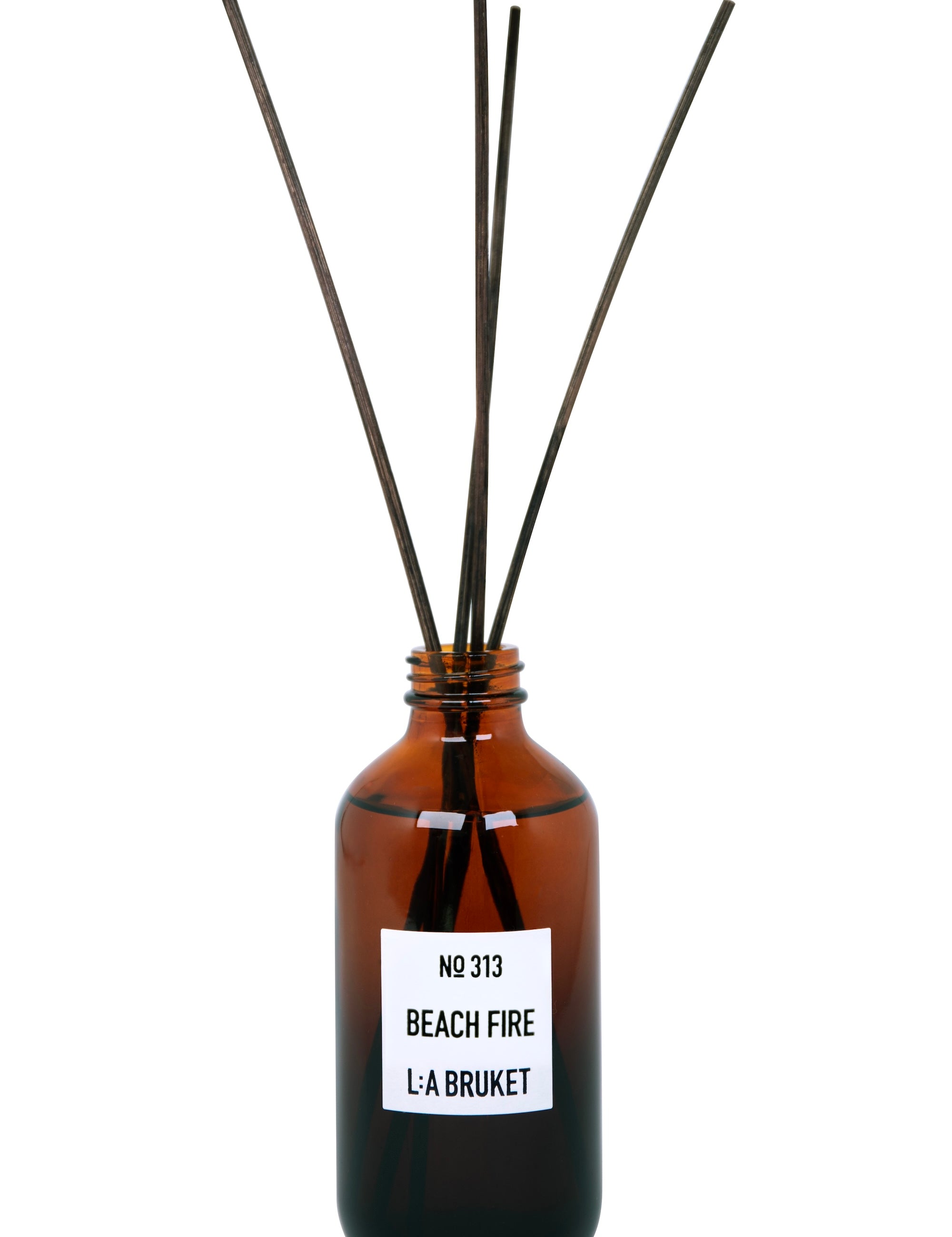 All natural, organic and vegan room diffuser in amber glass with the woody scent Beach Fire (previously Black Oak) from the best of Sweden's coastal home fragrance brand, L:A Bruket