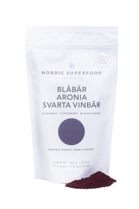 Large white pouch of all natural, handpicked organic wild superfoods from the Nordic nature, with blend of blue fruits - blueberry, blackcurrant and choke berry.