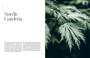 Close-up of green leaves with text on 'Nordic Gardens' on the left side.