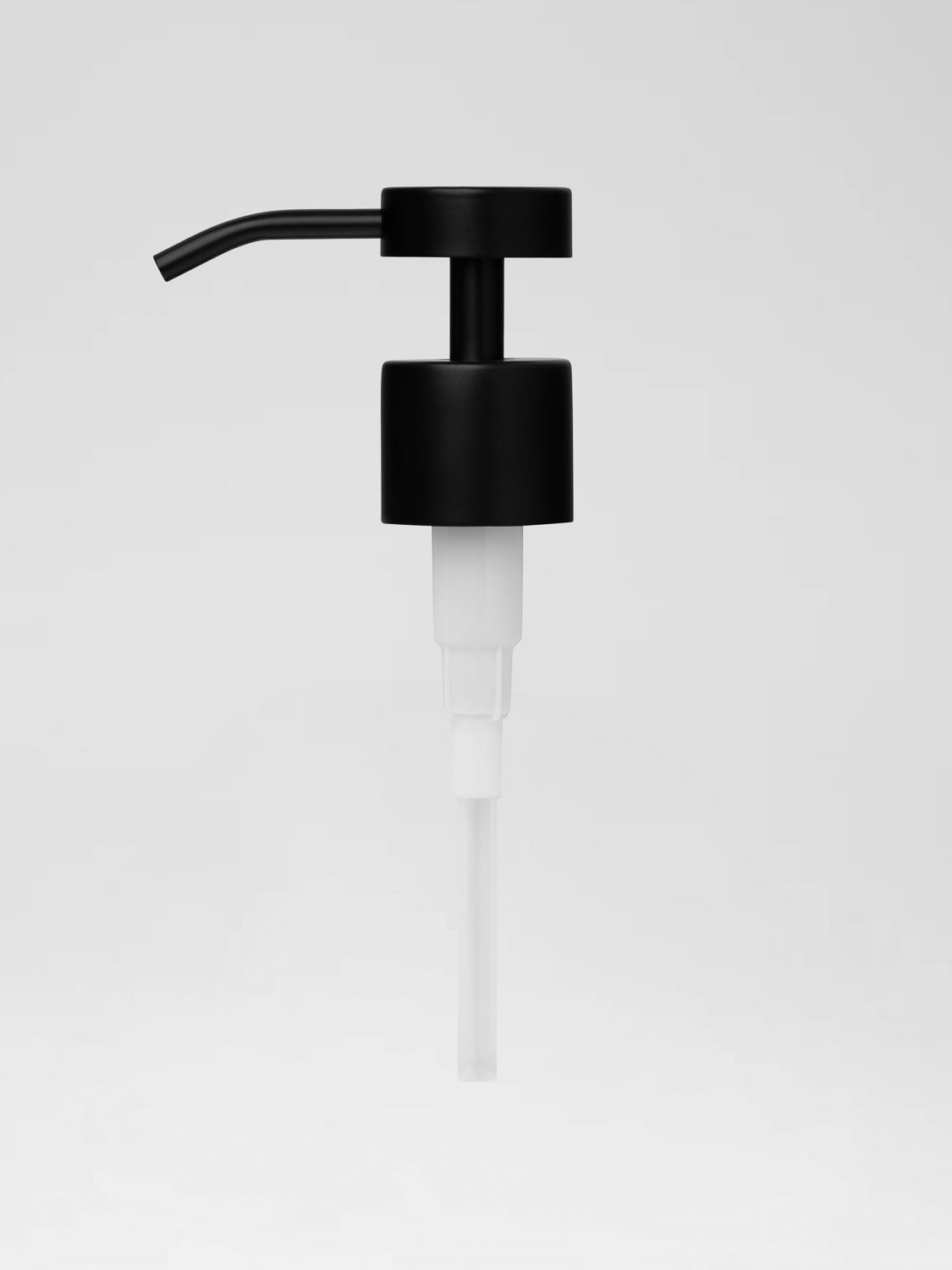 From Conscious Botanist, The Reuseable Pump in black, to fit all aluminium bottles for a modern bathroom and sustainable lifestyle