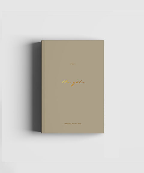 Soft touch hard cover notebook with gold foil text 'My Daily Thoughts' with blank pages for notes, sketches, poems and more, produced sustainably by Cozy Publishing.