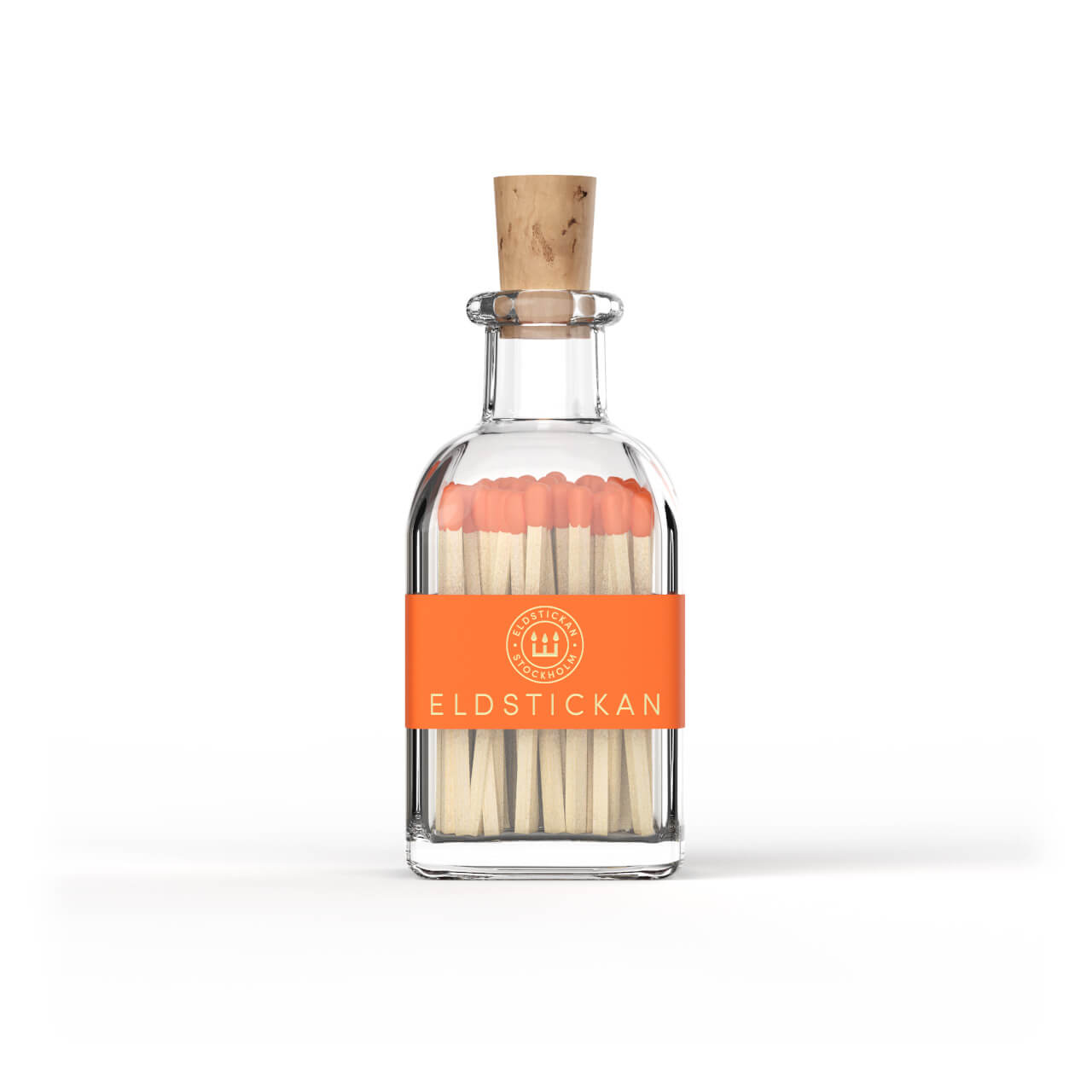 Orange coloured matches in a stylish glass bottle from Eldstickan for a great interior design idea