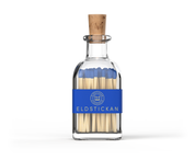 Blue coloured matches in a stylish glass bottle from Eldstickan for a great interior design idea